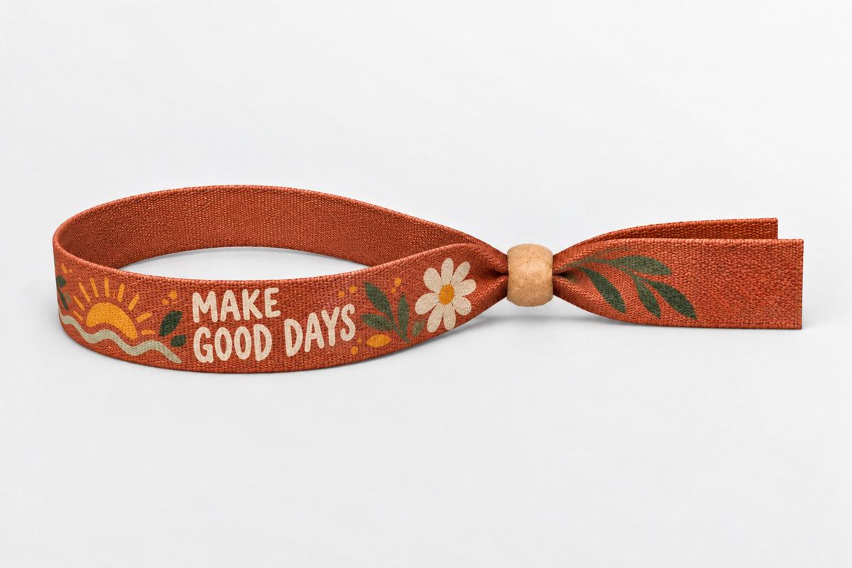 Orange bamboo fabric wristband with colour print and wooden lock