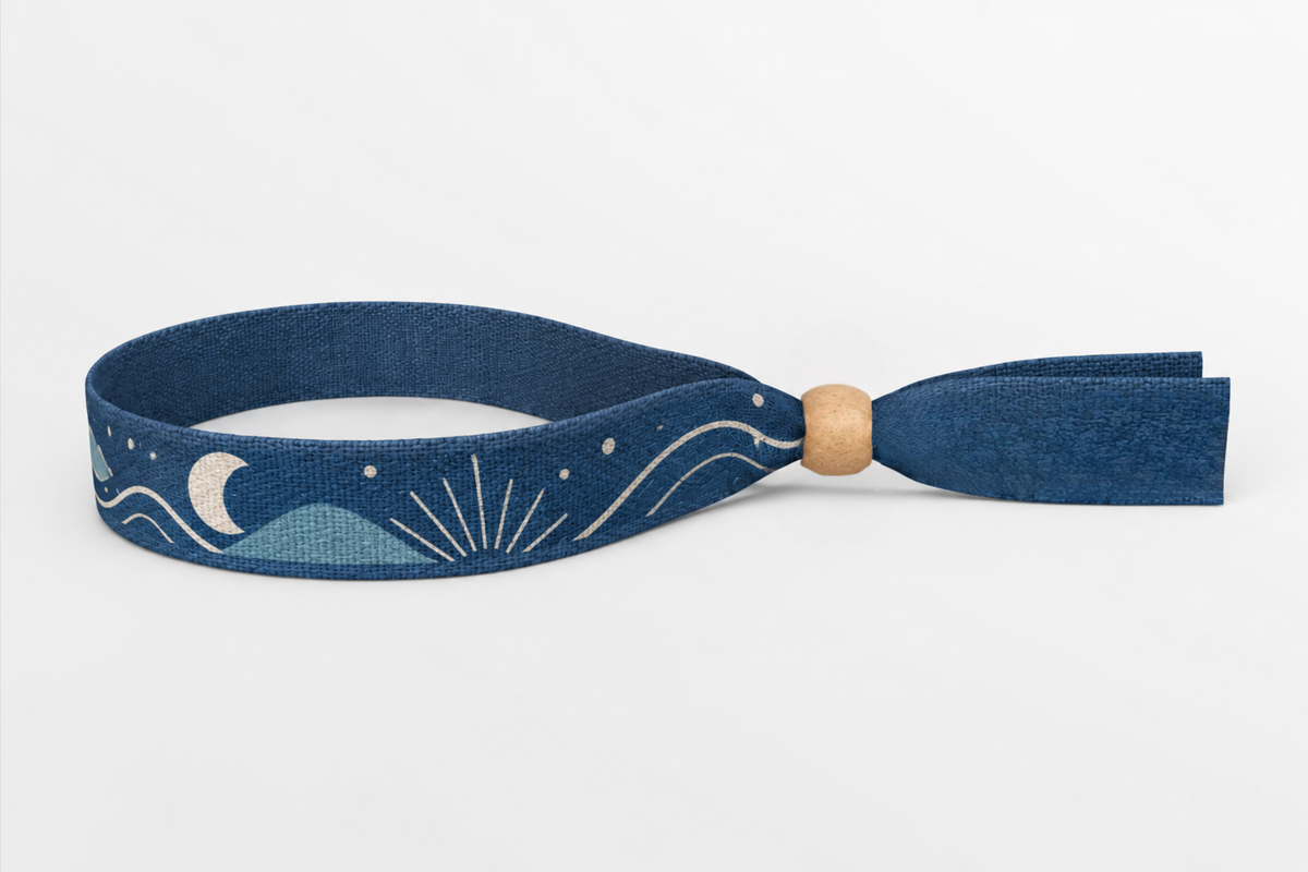Navy cotton wristband with printed moon and wave design
