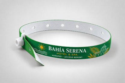 Green fabric wristband with white snap lock, side view